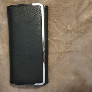 Unknown source  black with silver hardware wallet.